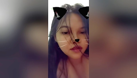 Beautiful and sexy college girl in red dress goes in her dorm