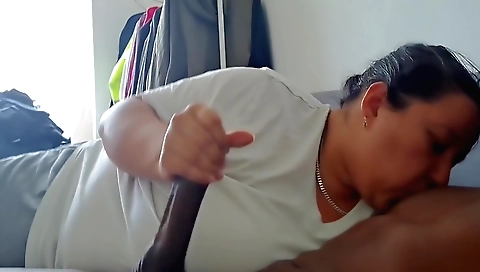 Amateur mature with a hairy pussy sucking a big cock