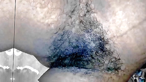 Hairy girl shows off her hairy pussy in a fetish video