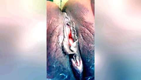 Indian woman with pink pussy is showing off in the bedroom