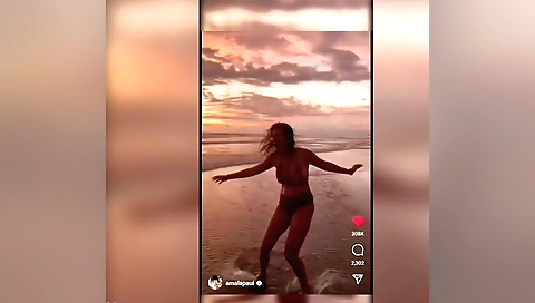 Stunning brunette in sexy lingerie shows off her body