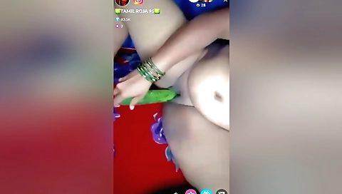 Chubby brunette with large boobs is giving a tango show