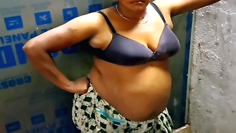 Indian teen in a schoolgirl outfit shows her ass in a solo vid