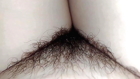 Busty Indian teen plays with hairy pussy and rides a man