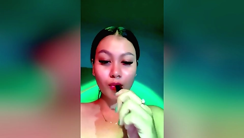 Indian slut loves to fuck her pussy in her bedroom