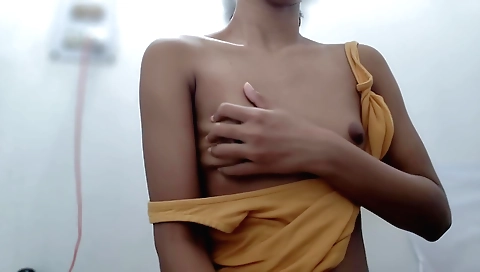 Beautiful brunette babe with a shaved pussy in a webcam show