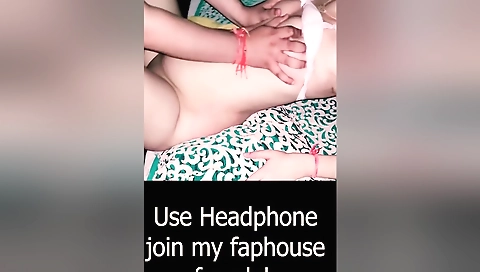 Indian wife and husband are cooking together in the kitchen