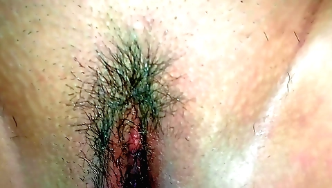 Indian slut with hairy pussy riding her lover's cock