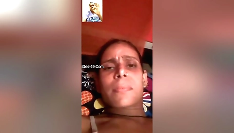 Bhabi is showing off her hairy pussy in a solo video