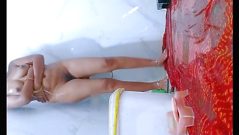 A kinky horny indian is in the bathroom in her bikini