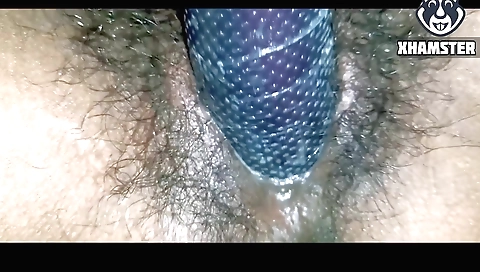 Hairy girl shows off her hairy pussy with a vibrator