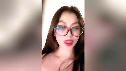 Busty indian teen masturbates on a camera on the couch