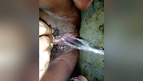 Indian babe masturbating in bathroom with homemade toy