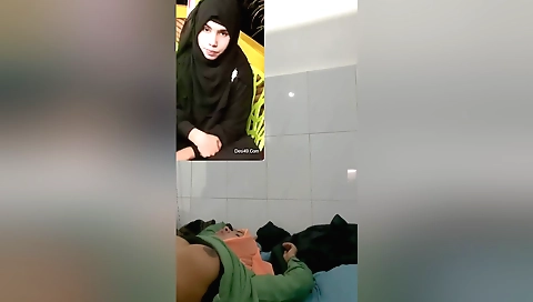 Sexy brunette takes a big cock in her mouth and pussy