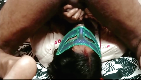 Indian teacher shows her students how to do their homework